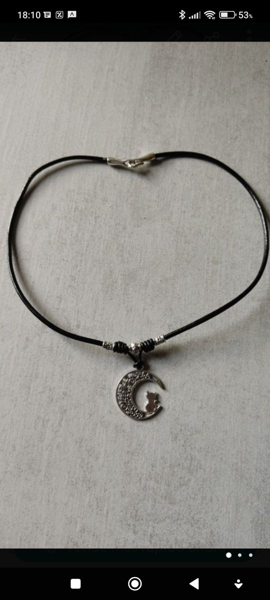 colgante gato en la luna