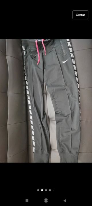 Chándal Nike rosa fluorescente y negro de segunda mano por 27 EUR en  Majadahonda en WALLAPOP