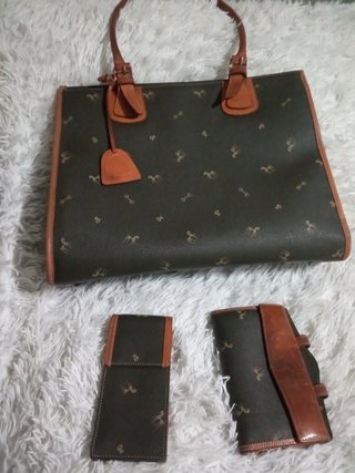 Bolso del corte inglés petusco con accesorios de segunda mano por 25 EUR en  El Puerto de Santa María en WALLAPOP