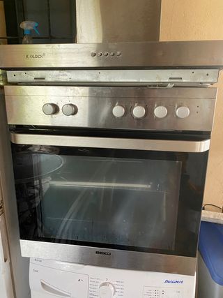 Horno vitrocerámica y campana extractor de segunda mano por 75 EUR en  Benidorm en WALLAPOP