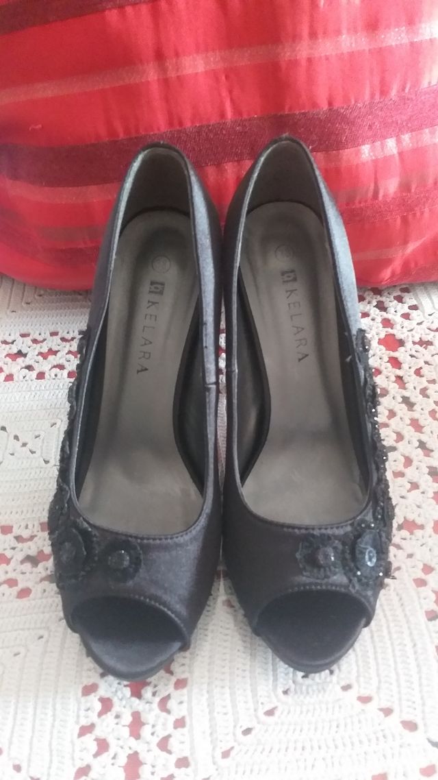 zapatos negros de razón y brillo n 38