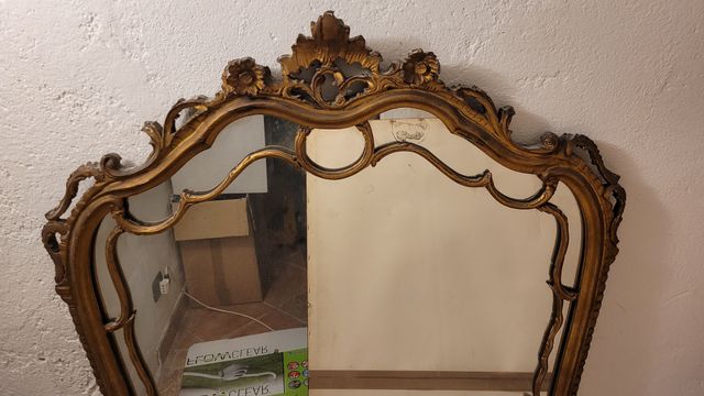 Antica specchiera da muro in legno dorato