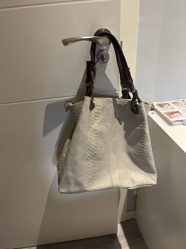 bolso piel, comprado en el corte