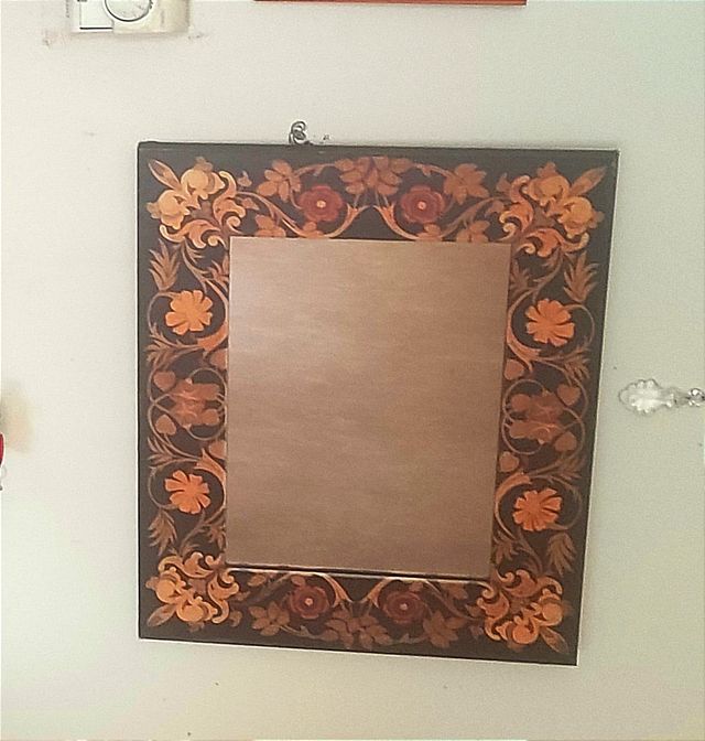 Espejo de pared decorado