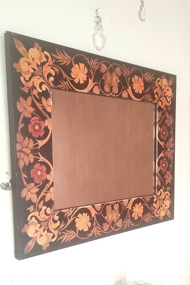 Espejo de pared decorado