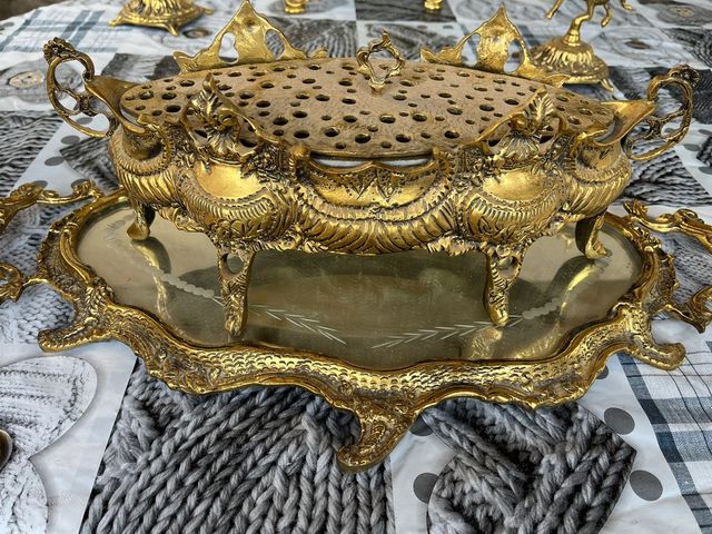 Orologio, candelabri, centrotavola