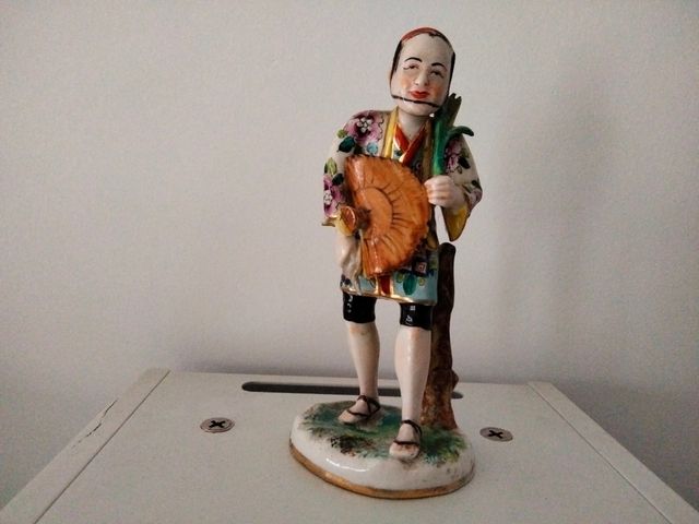 Figura de caminante chino
