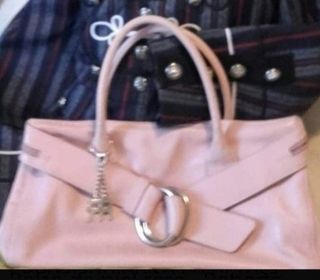 Bolso piel rosa Roberto Pietri El Corte Ingles de segunda mano por 19 EUR  en Madrid en WALLAPOP