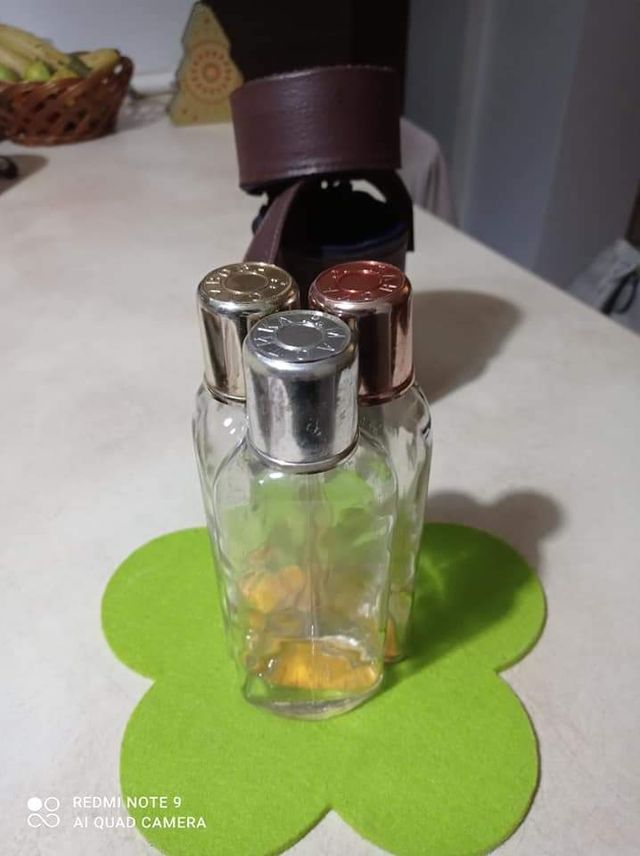 portabottigliette con 3 bottigliette in pelle