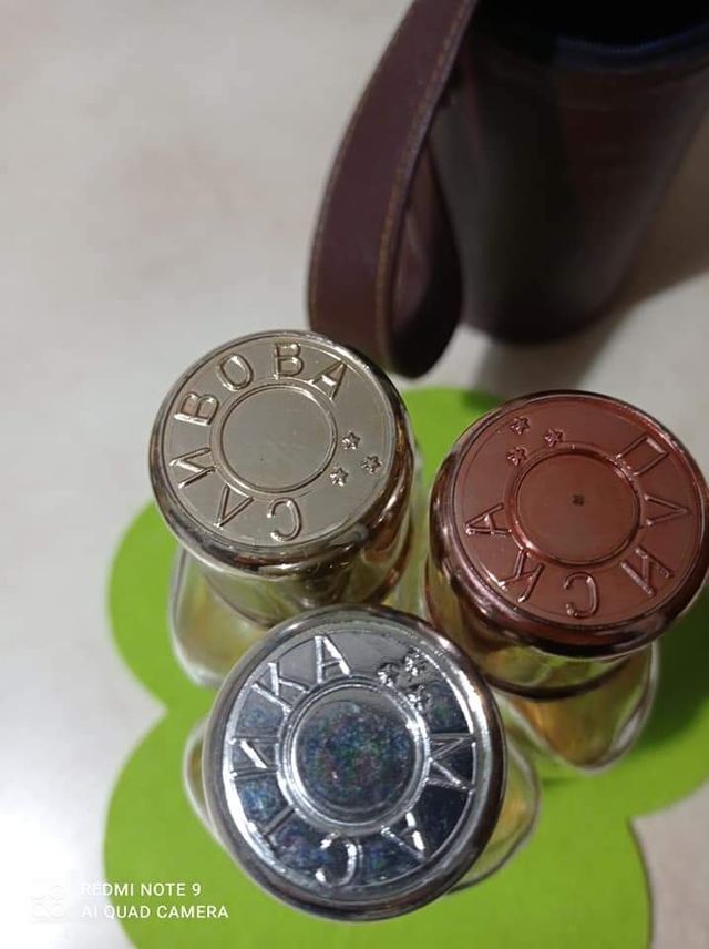 portabottigliette con 3 bottigliette in pelle