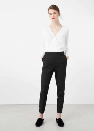 Mono blanco y negro Mango S de segunda mano por 15 EUR en Colonia Covibar  en WALLAPOP