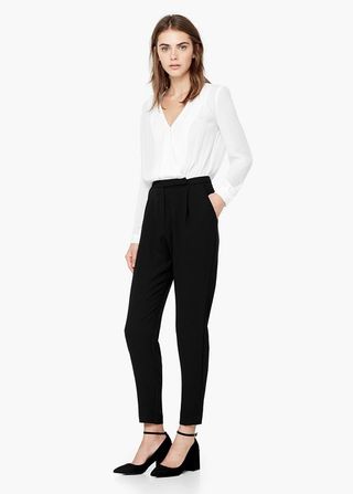 Mono blanco y negro Mango S de segunda mano por 15 EUR en Colonia Covibar  en WALLAPOP
