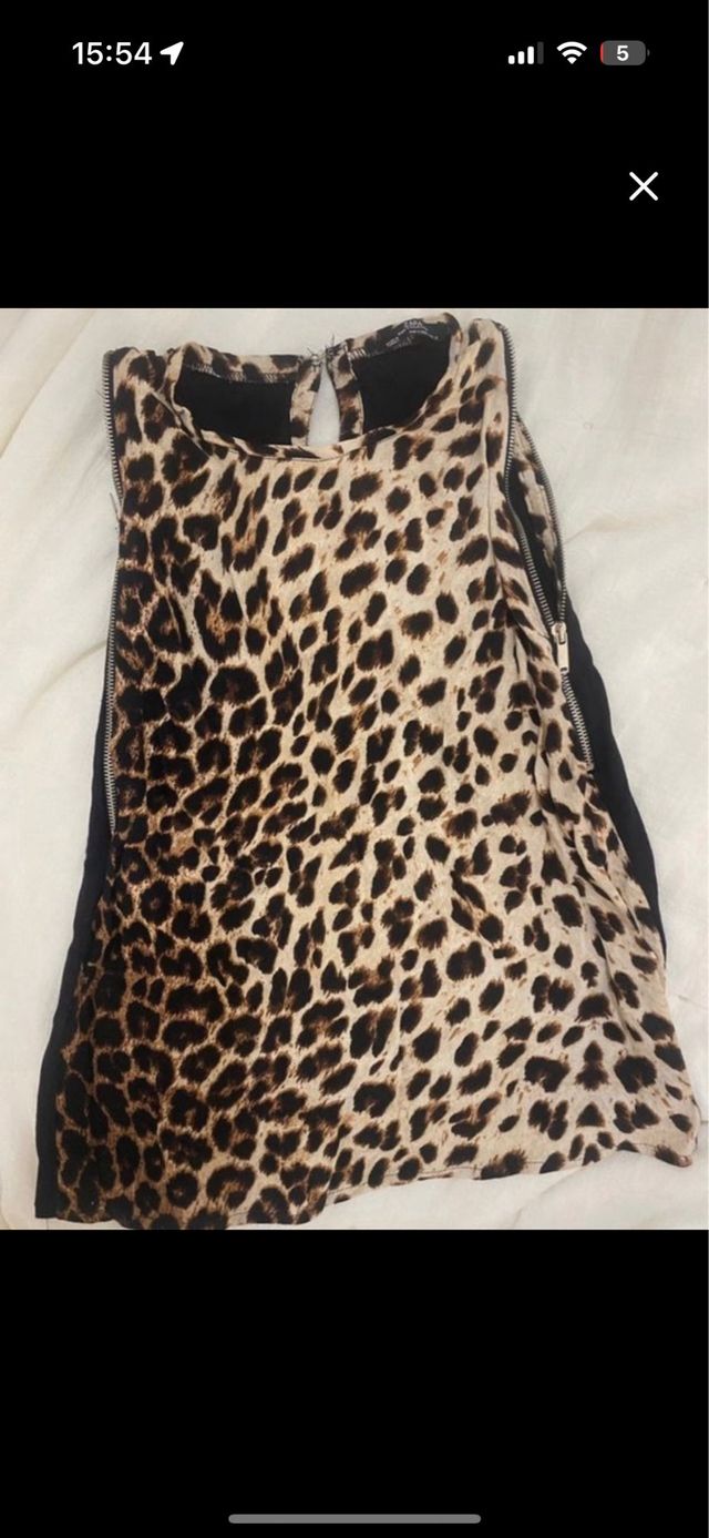 Top Zara animal print con cremalleras