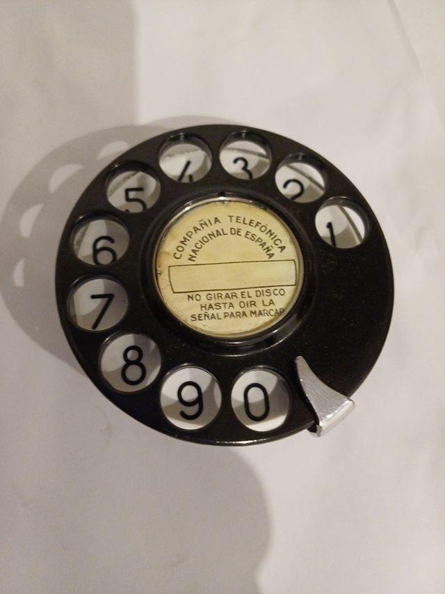 disco numérico antiguo esmaltado o de plásticoc