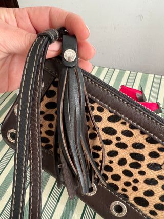 Tous Clutch de leopardo nuevo a estrenar en piel de segunda mano por 75 EUR  en Navalcarnero en WALLAPOP