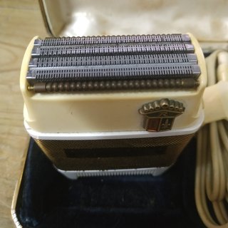 Maquina de afeitar - Remington Rolectric