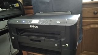 Impresora Epson 7210 sublimación de segunda mano por 210 EUR en Dos  Hermanas en WALLAPOP