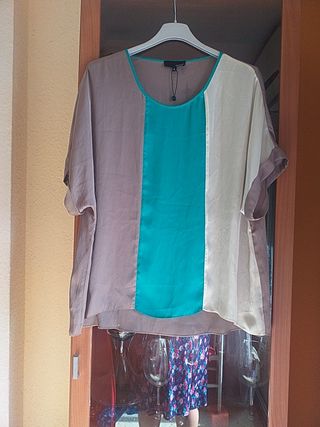 Blusa Seda Firma Couchel nueva sin uso. de segunda mano por 10 EUR en Santa  Cruz de Tenerife en WALLAPOP