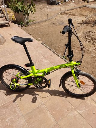 Bicicleta plegable TILT 500 btwin amarillo de segunda mano por 170 EUR en  Cerdanyola del Vallès en WALLAPOP