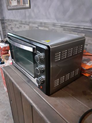 Horno portátil de segunda mano por 30 EUR en San Juan del Puerto en WALLAPOP