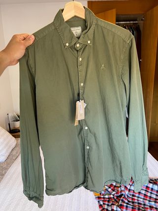 Camisa scalpers hombre verde de segunda mano por 39 EUR en Madrid en  WALLAPOP