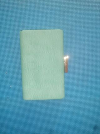 Bolso clutch verde aguamarina de segunda mano por 14 EUR en Aranjuez en  WALLAPOP