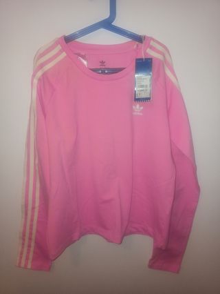 Camiseta Adidas , rosa salmon de segunda mano por 10 EUR en Talavera de la  Reina en WALLAPOP