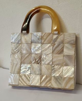 Bolso mano nacar vintage de segunda mano por 18 EUR en Blanes en WALLAPOP