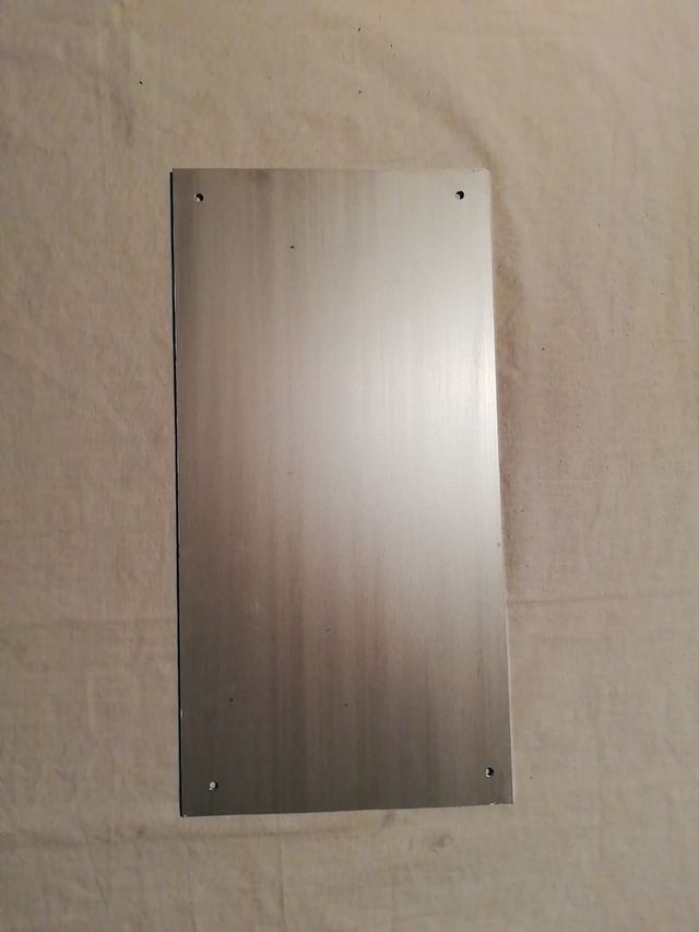 Antigua placa aviso de sobrecarga.