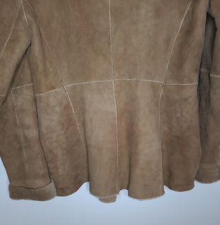 Abrigo piel vuelta Massimo Dutti de segunda mano por 145 EUR en  Donostia-San Sebastián en WALLAPOP