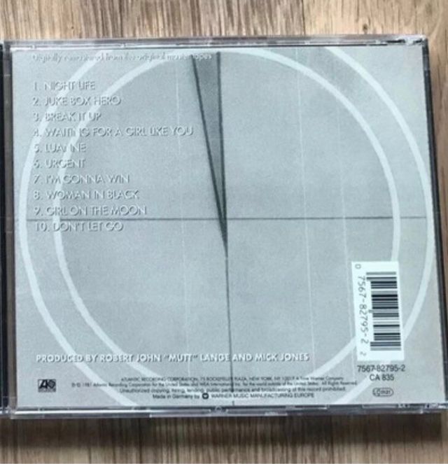 FOREIGNER camiseta M + cd "4" y foto autografiados