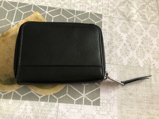 Monedero negro marca Pikolinos de piel. de segunda mano por 39 EUR en  Alicante en WALLAPOP
