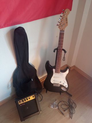 Guitarra eléctrica y amplificador Zipy de segunda mano por 90 EUR en Gijón  en WALLAPOP