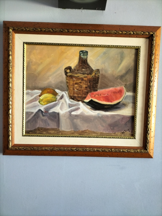 dos cuadros pintados al oleo, con marco de madera