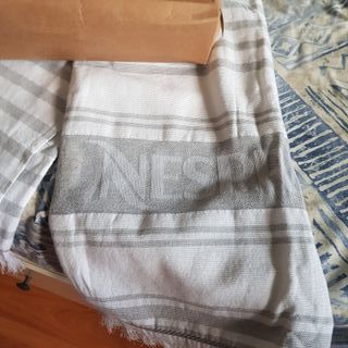 Toalla de playa Nespresso Preciosa toalla de playa de segunda mano por 10  EUR en Galapagar en WALLAPOP