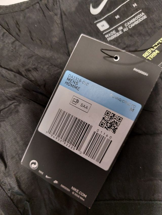 chaleco running nike