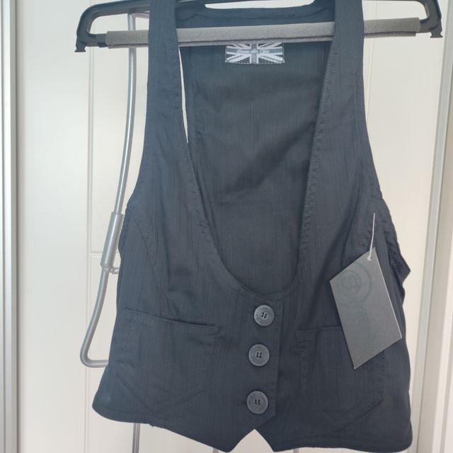 Chaleco negro entallado mujer