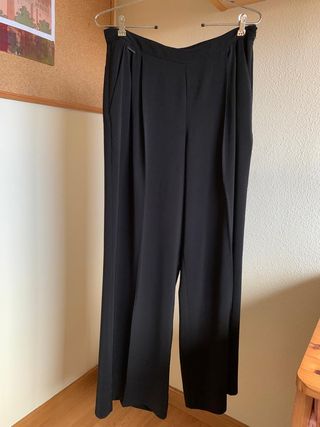 Pantalón Palazzo negro, talla 40, Tintoretto de segunda mano por 30 EUR en  Madrid en WALLAPOP