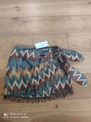 Falda pareo abalorios Zara de segunda mano por 35 EUR en Donostia-San  Sebastián en WALLAPOP