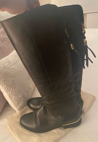 Negras planas de Botas para Mujer | FASHIOLA.es