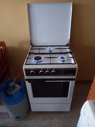 Cocina SuperSer Gas butano con Horno y Grill de segunda mano por 75 EUR en  Lloret de Mar en WALLAPOP