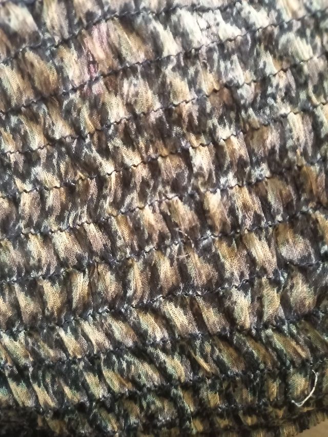 Blusa con disegni geometrici