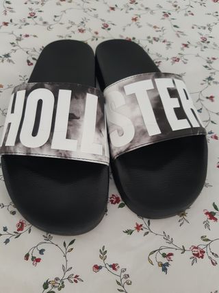 Chanclas de cuero con trabilla con el logo en negro de Hollister - GLAMI.es