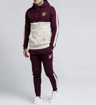 Chandal conjunto SIK SILK granate de segunda mano por 60 EUR en Errenteria  en WALLAPOP
