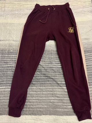 Chandal conjunto SIK SILK granate de segunda mano por 60 EUR en Errenteria  en WALLAPOP