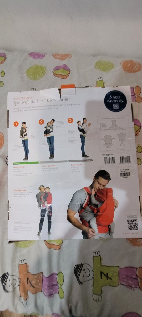 mochila portabebés STOKKE