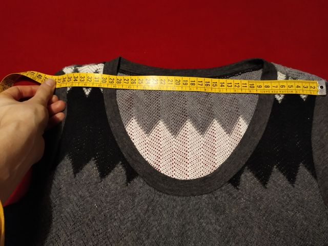 Maglia smanicata per donna