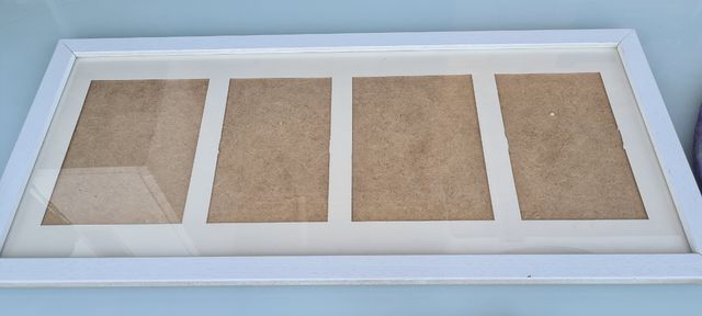 Marco blanco para 4 fotos en buen estado