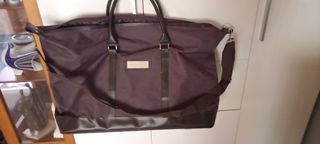 BOLSA DE VIAJE DE CAROLINA HERRERA de segunda mano por 50 EUR en Madrid en  WALLAPOP
