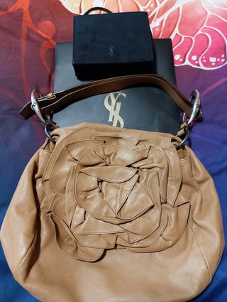 Bolso Saint laurent y estuche monedero Ysl. de segunda mano por 120 EUR en  Málaga en WALLAPOP